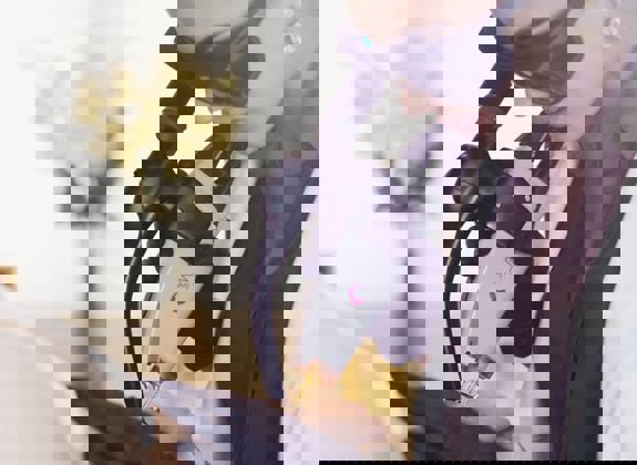 Specialist performing laser skin treatment with advanced technology at Opsis Clinical