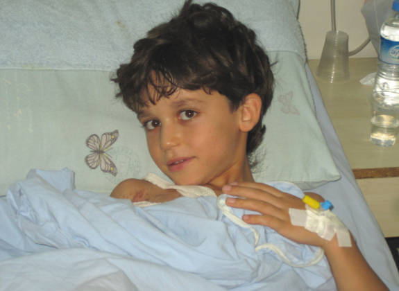 Child receiving compassionate medical care during a humanitarian mission