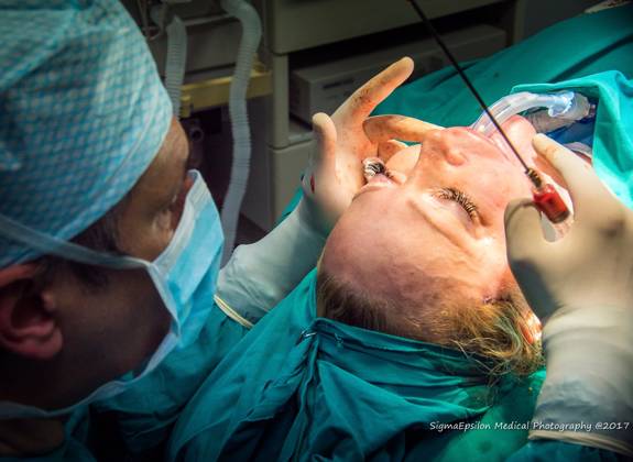 Dr Ioannis Liapakis performing advanced facial plastic surgery procedure